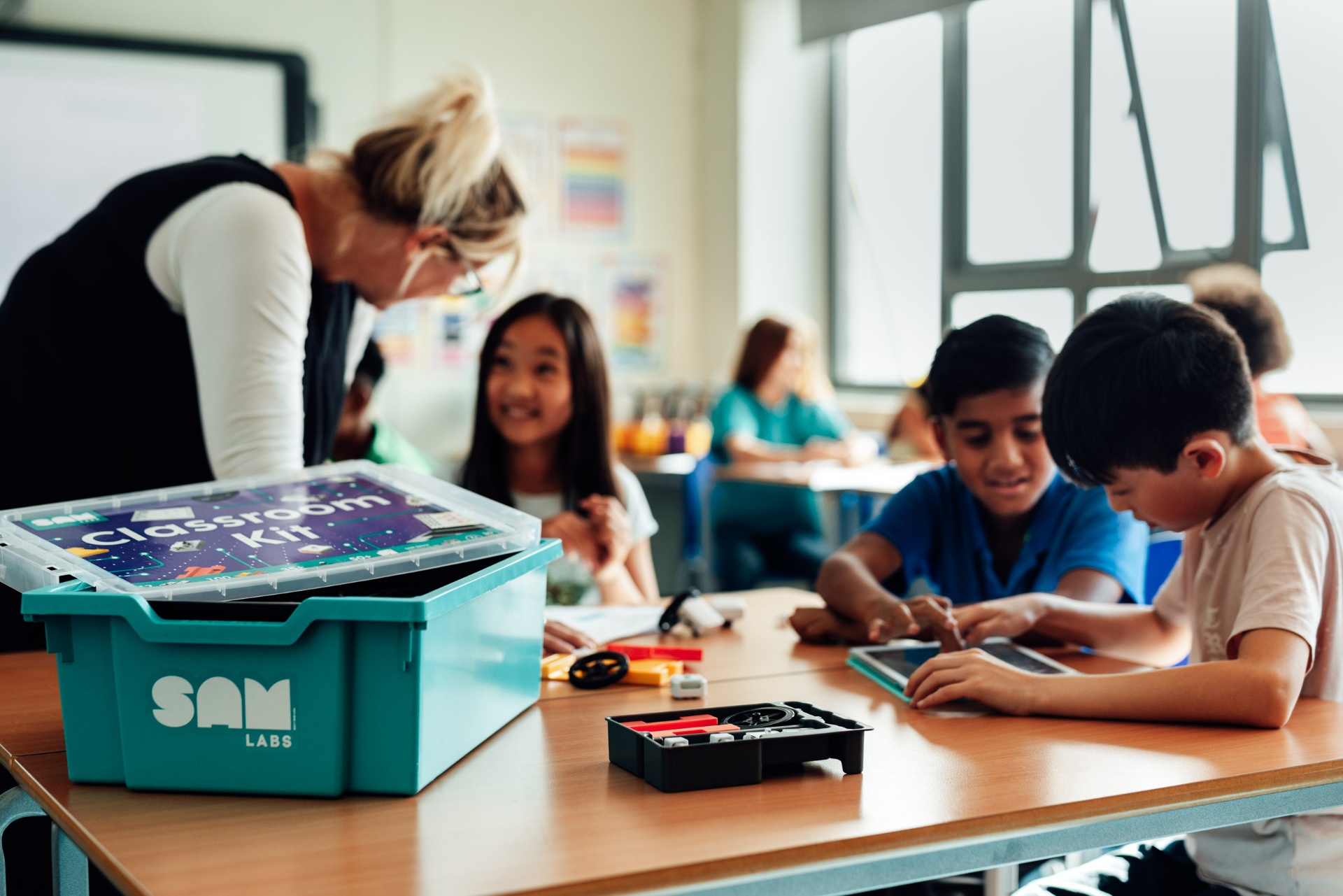 Teacher guiding students